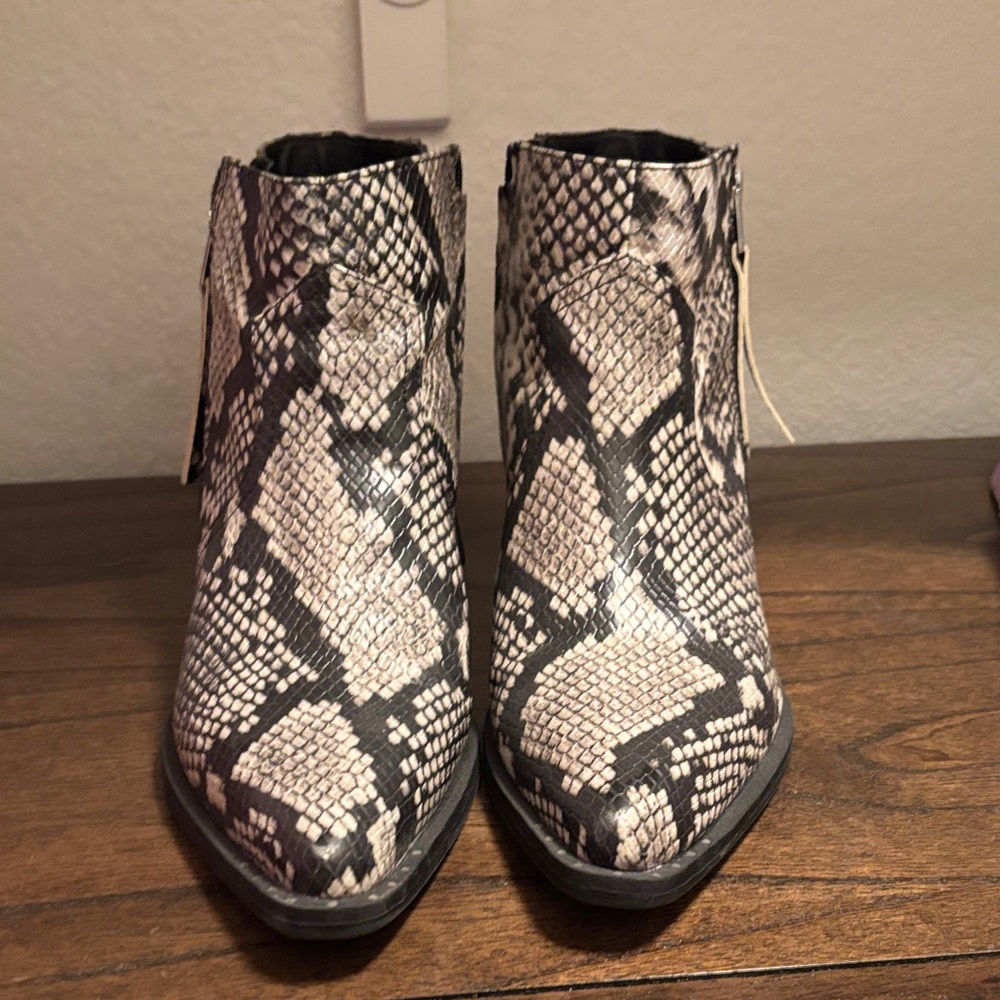 Circus by Sam Edelman Snake-Print Pointed Ankle Booties in Black and Cream